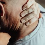 Photo by Kindel Media: https://www.pexels.com/photo/close-up-photo-of-a-man-having-a-neck-pain-7298881/
