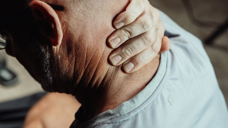Photo by Kindel Media: https://www.pexels.com/photo/close-up-photo-of-a-man-having-a-neck-pain-7298881/