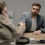 Photo by cottonbro studio: https://www.pexels.com/photo/men-shaking-hands-at-work-6814529/