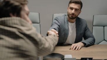 Photo by cottonbro studio: https://www.pexels.com/photo/men-shaking-hands-at-work-6814529/