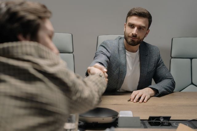 Photo by cottonbro studio: https://www.pexels.com/photo/men-shaking-hands-at-work-6814529/